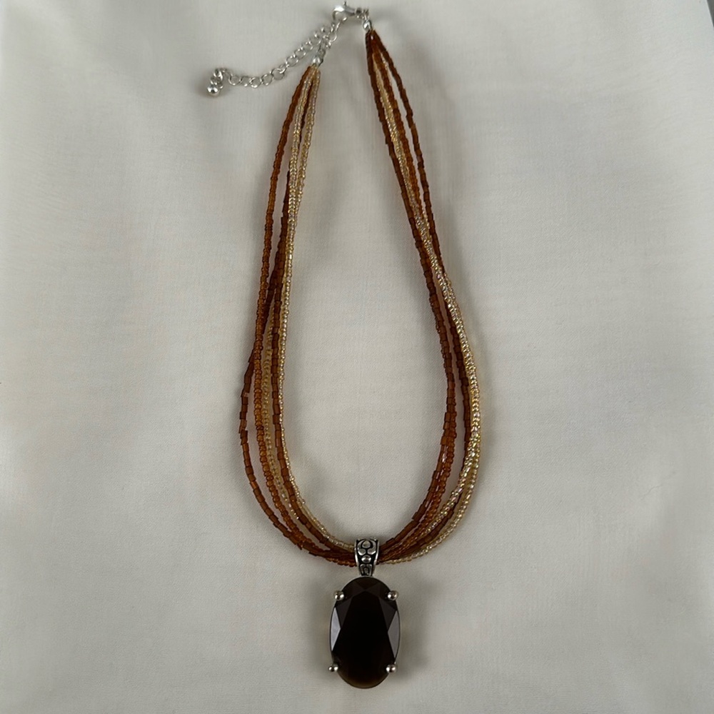 Topaz pendant with tiny bead choker.
